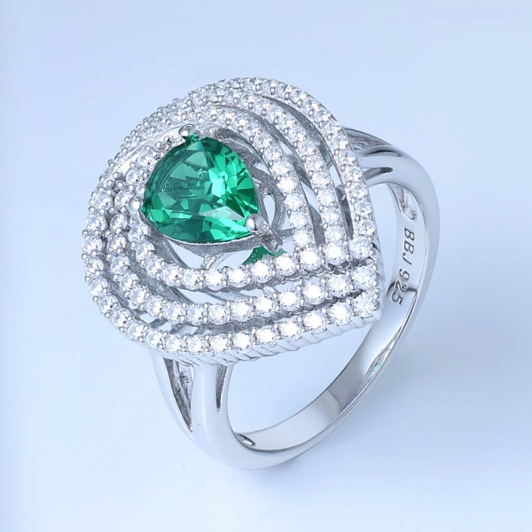 rodio verde esmeralda sobre joyería de plata esterlina a juego 