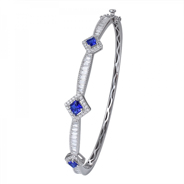 zafiro azul creado y brazalete de rodio cz blanco con corte baguette sobre plata 