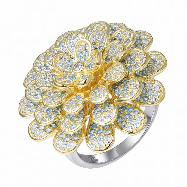cambio gradual zafiro azul oro amarillo sobre anillo en forma de flor 
