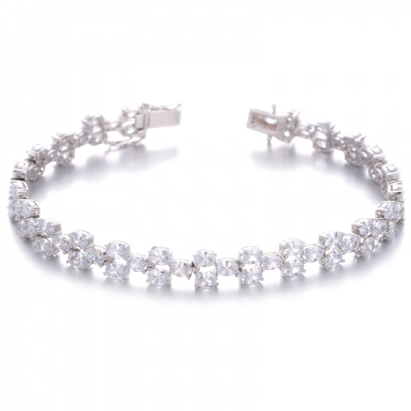 Pulsera de plata con circonita cúbica blanca y nano morganita de forma ovalada con baño de oro rosa 