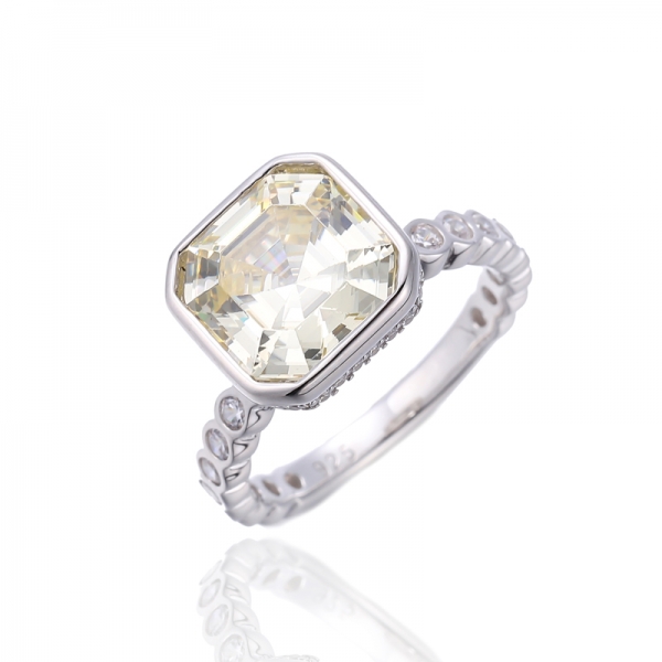 Anillo Asscher de plata rodiada con circonita cúbica blanca redonda y canaria 