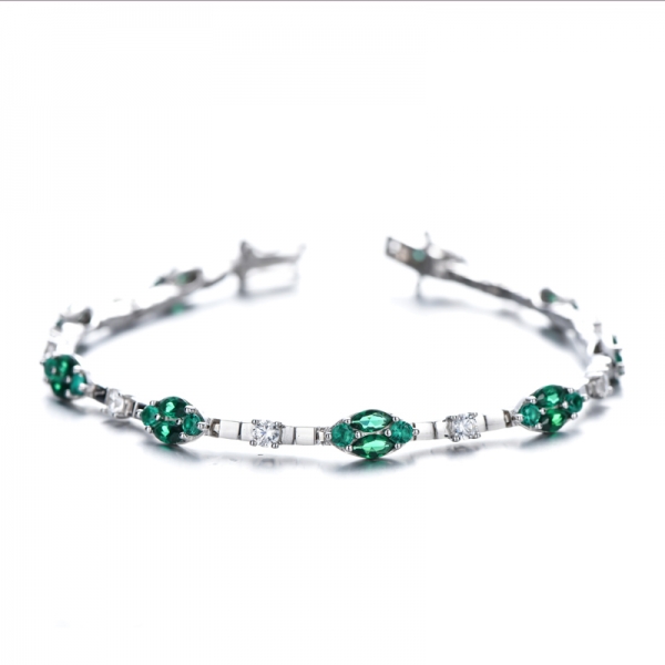 Pulsera de plata rodiada con circonita cúbica blanca redonda y nano verde con forma de marquesa 