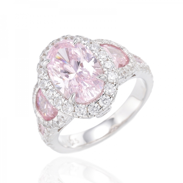 Anillo de plata con baño de rodio y circonita cúbica rosa con forma de media luna y diamante en forma ovalada 