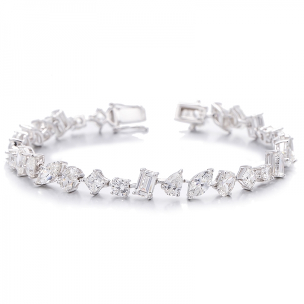 Pulsera de plata rodiada con circonita cúbica de color G y diamante marquesa de talla esmeralda 