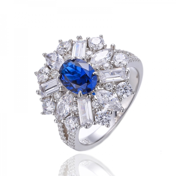 Anillo de plata rodiada con circonita cúbica blanca nano y marquesa azul de forma ovalada 925 