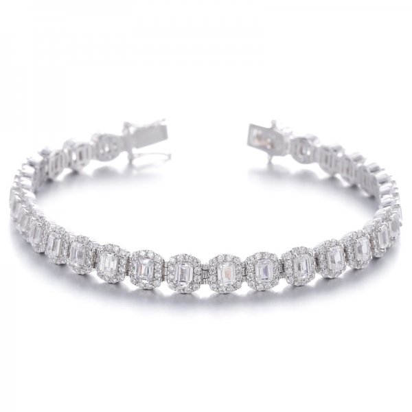 
     Pulsera de plata rodiada con circonita cúbica blanca redonda y nano verde de corte esmeralda
     