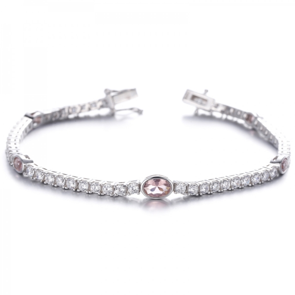 
     Pulsera de plata rodiada con circonita cúbica blanca redonda y nano morganita de forma ovalada
     