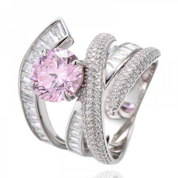 Anillo de plata rodiada con tanzanita redonda y circonita cúbica blanca talla baguette 